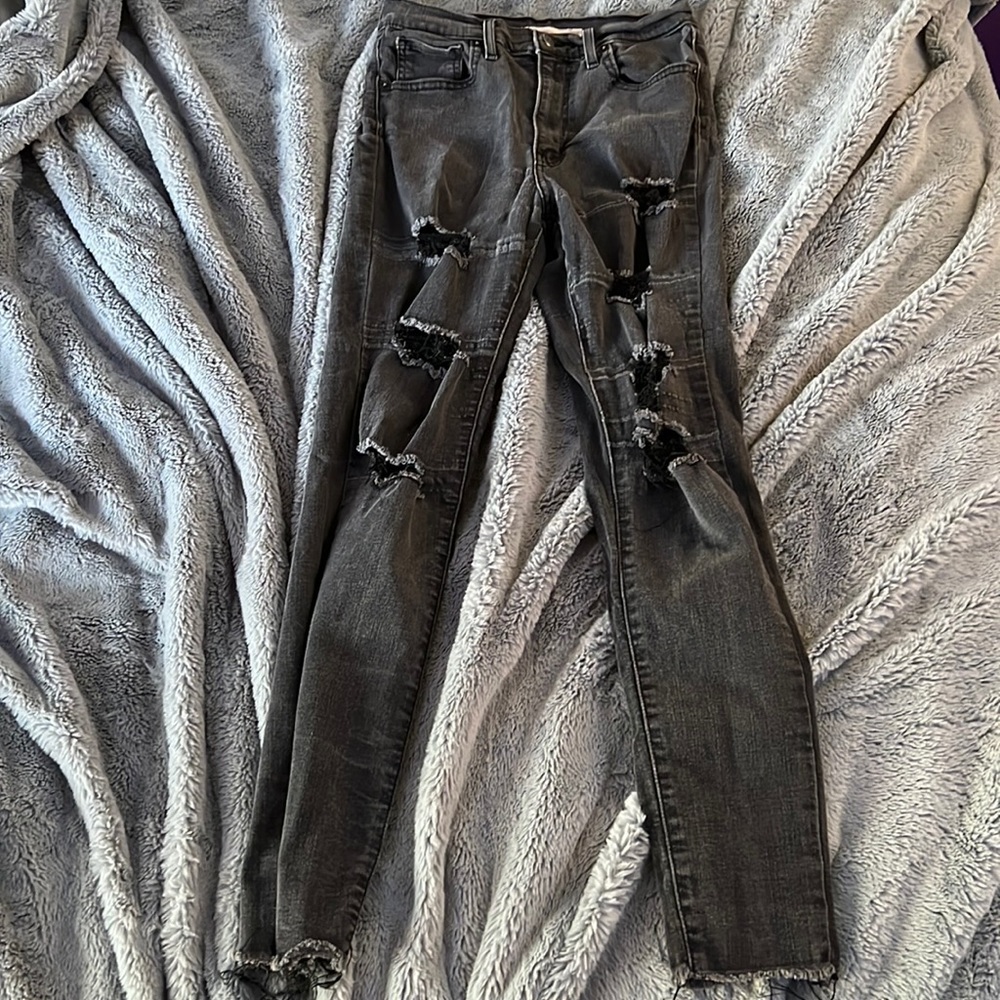 black worn jeans levi size 28